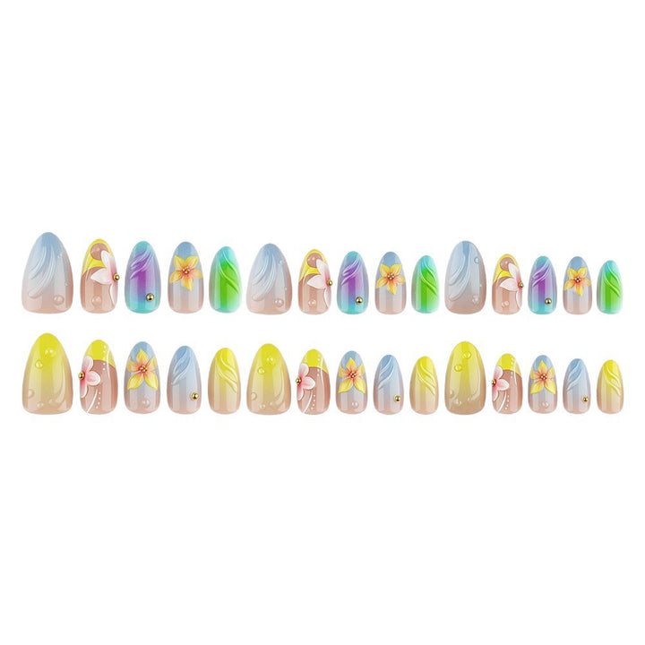Acrylic nail set with floral elements and colorful accents Bowlift