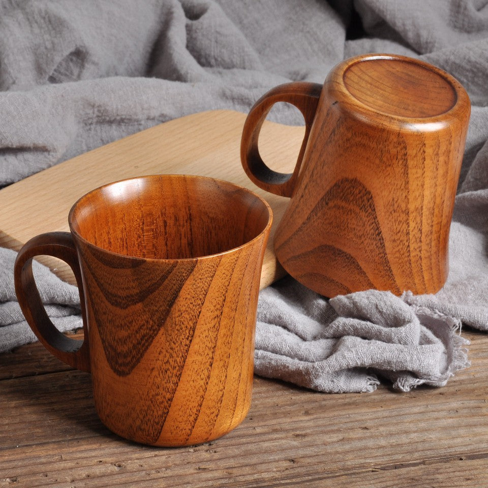 Wooden cup with spoon Bowlift
