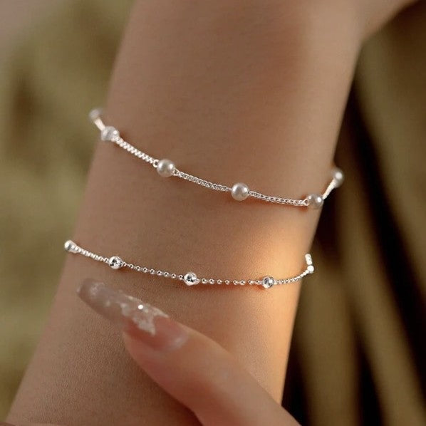 Adjustable Pearl Charm Bracelet Bowlift