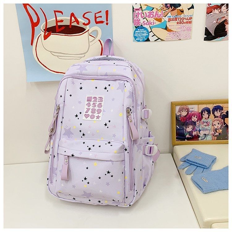 Playful backpack with star motifs and practical functions Bowlift