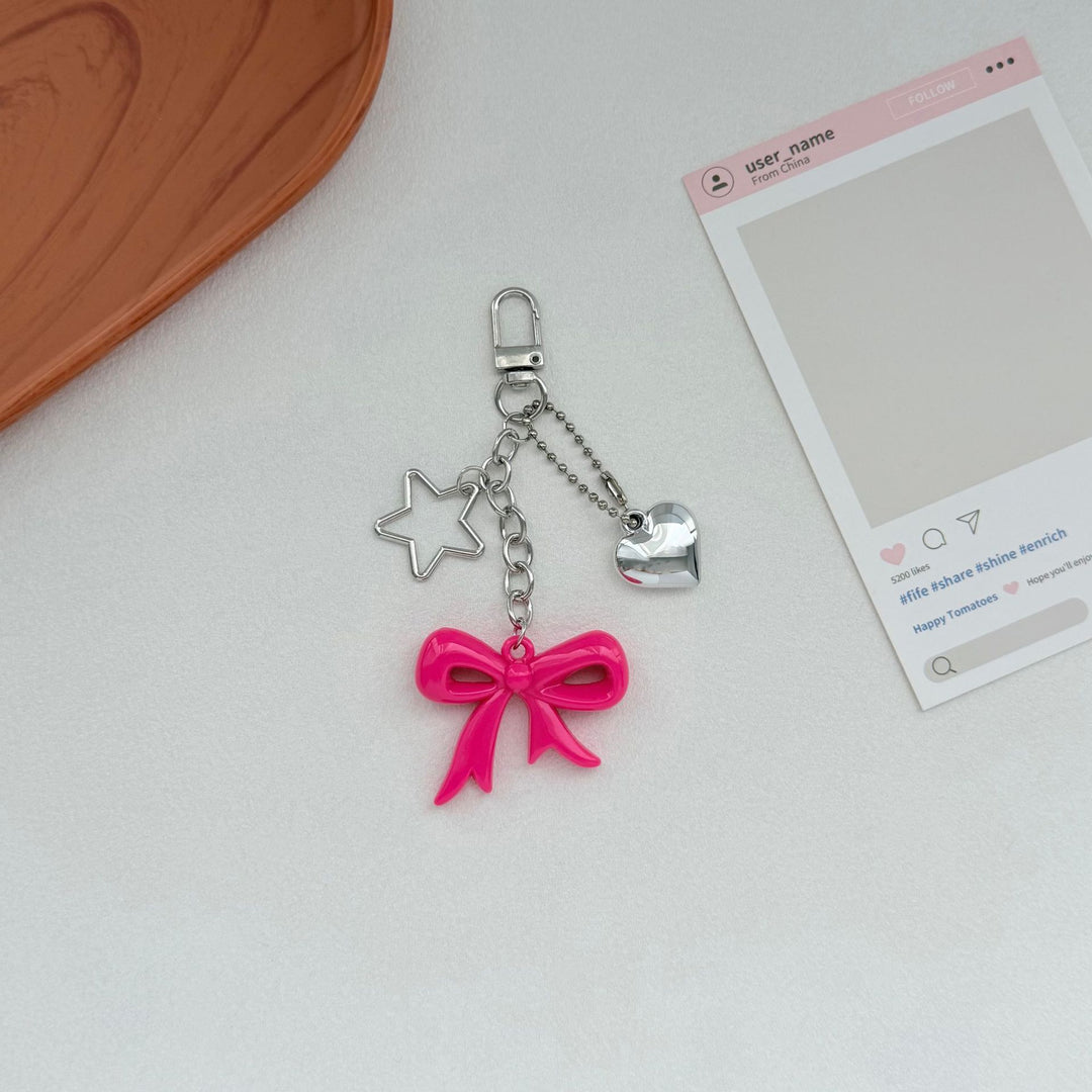 Playful Bow and Star Keychain Bowlift