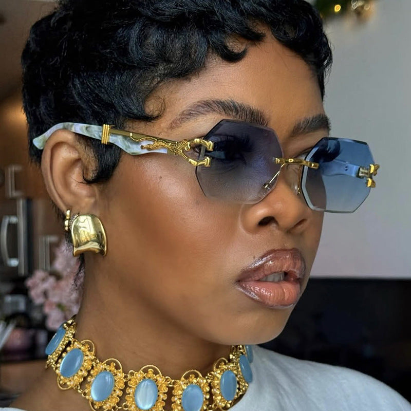 Women's fashionable sunglasses with extravagant octagonal design and golden accents Bowlift