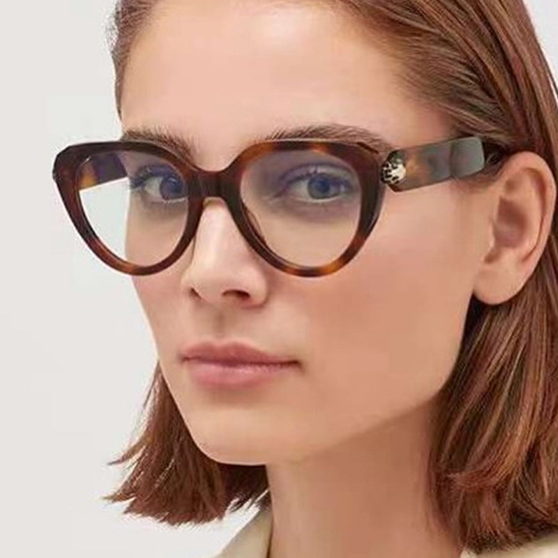 Ladies Cat-Eye Sunglasses with Golden Accents and Protective UV Filter Bowlift