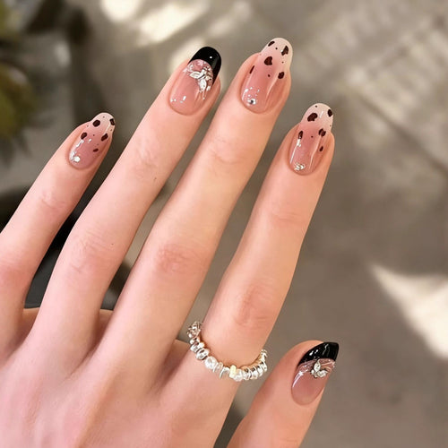 Artificial nails in a modern style with elegant embellishments Bowlift