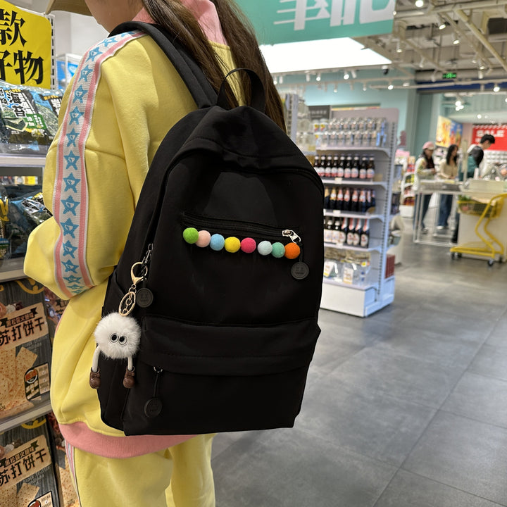 Practical backpack with colorful applications Bowlift
