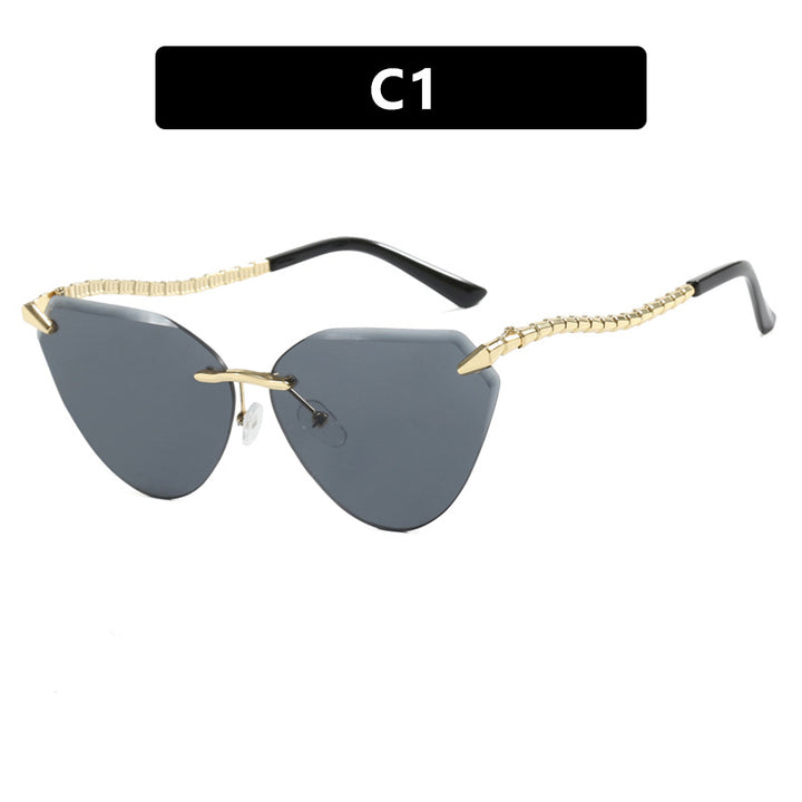 Women's Cat-Eye Sunglasses with unique gold frame design and protective lenses Bowlift