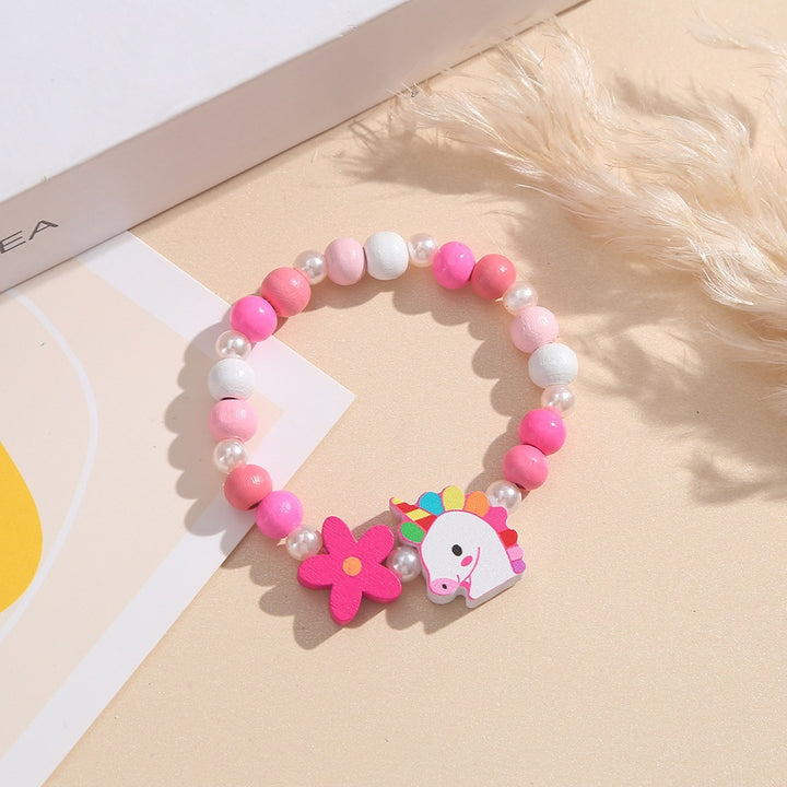 Playful children's bracelet with unicorn and flower motif Bowlift