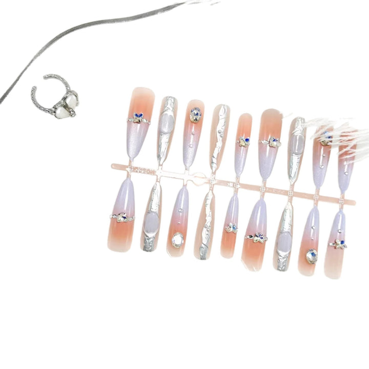 Artificial nails with elegant glitter and crystal accents Bowlift
