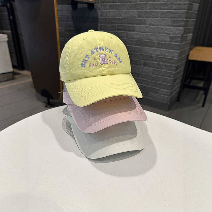 Women's Playful Embroidered Cap Bowlift