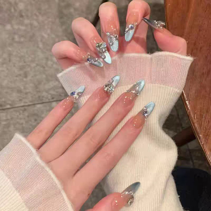 Artificial nails with elegant ombre effect and glitter coating Bowlift