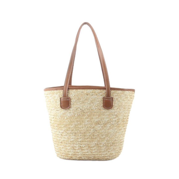 Braided basket bag with elegant leather handles Bowlift