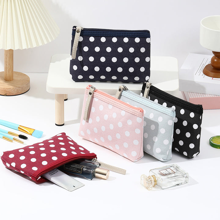Canvas polka dot cosmetic pouch with zippered faux leather pull Bowlift