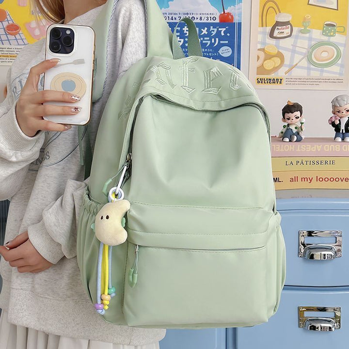 Fashionable backpack with removable charms Bowlift