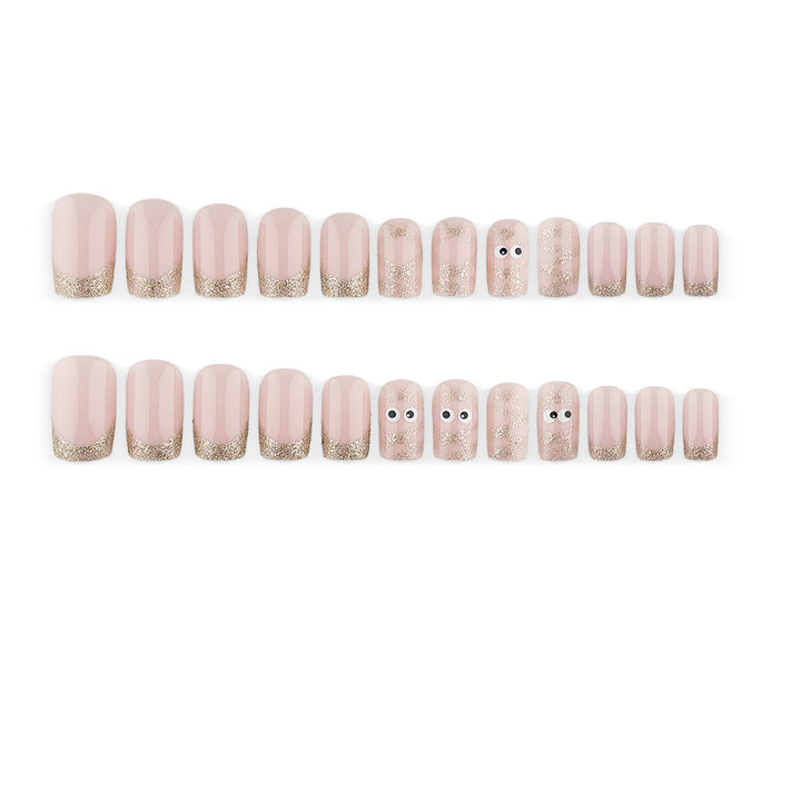 Artificials nails with playful eye design and glitter tips Bowlift