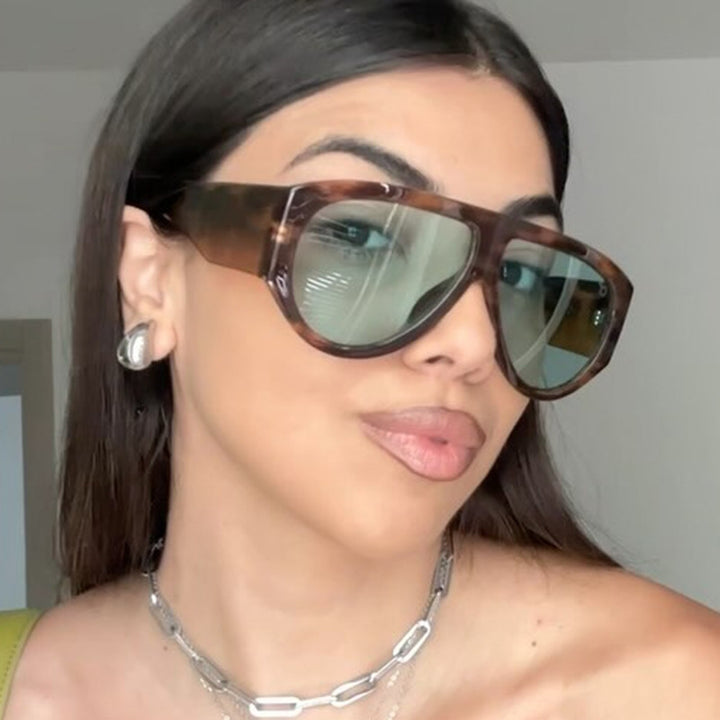 Ladies fashionable sunglasses in modern design with wide frame Bowlift