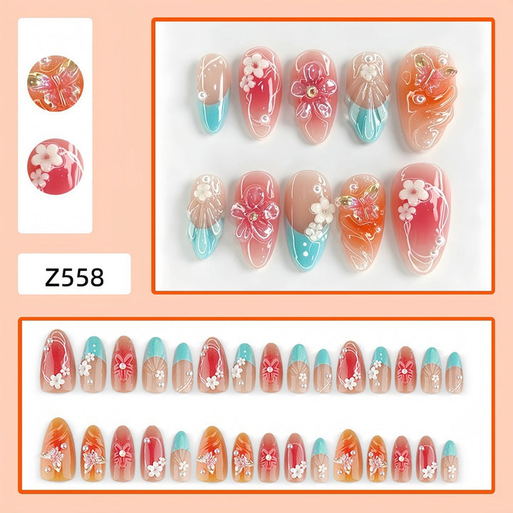 Artificial nail set with floral accents and glittering 3D applications Bowlift