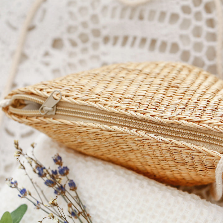 Handcrafted basket bag in unique half-moon design Bowlift