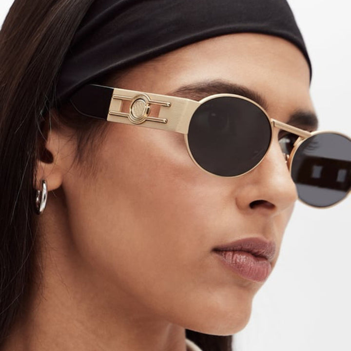 Ladies round sunglasses with fashionable metal frame and UV protection Bowlift