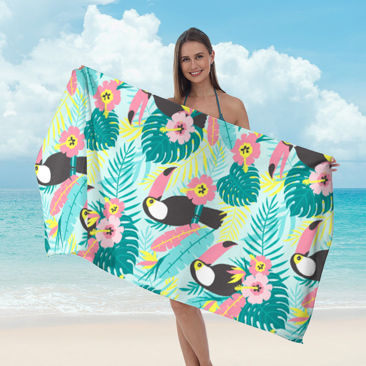 Beach towel with tropical palm leaf design Bowlift