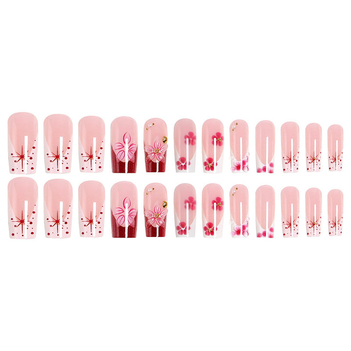 Artificial nail set with floral detail and glitter effects Bowlift