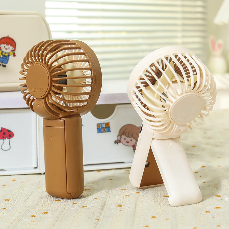 Unisex nano compact battery handheld fan with clip function and brushless whisper drive Bowlift