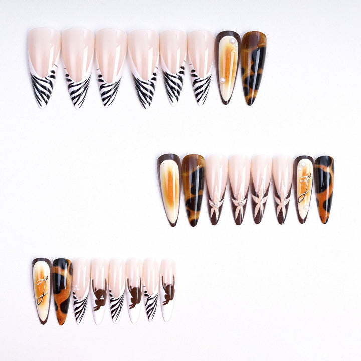 Artificial nails with elegant droplet and animal designs Bowlift