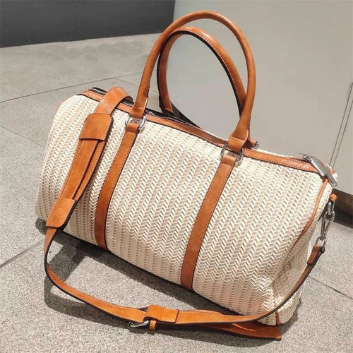 Spacious travel bag with practical carrying handles and adjustable shoulder strap Bowlift