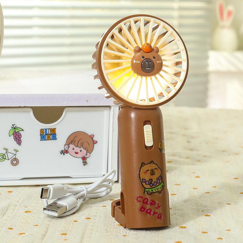 Unisex portable USB hand fan with integrated LED light and clip Bowlift