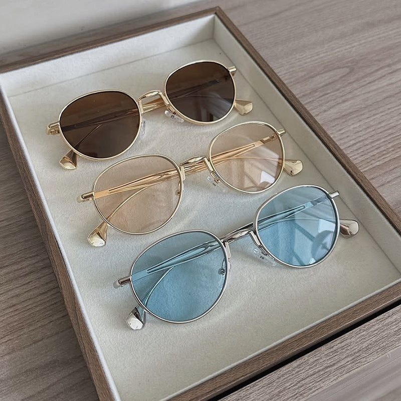 Women's round sunglasses with elegant metal frame and UV protection Bowlift