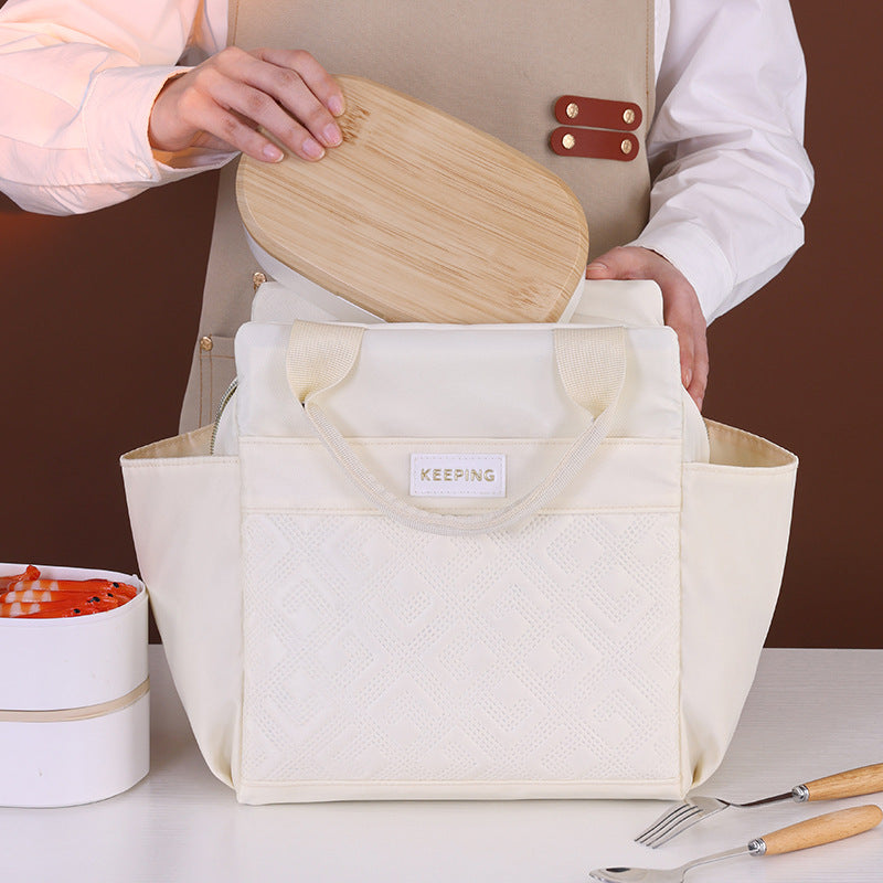 Cooler bag with insulating interior and practical compartment design Bowlift