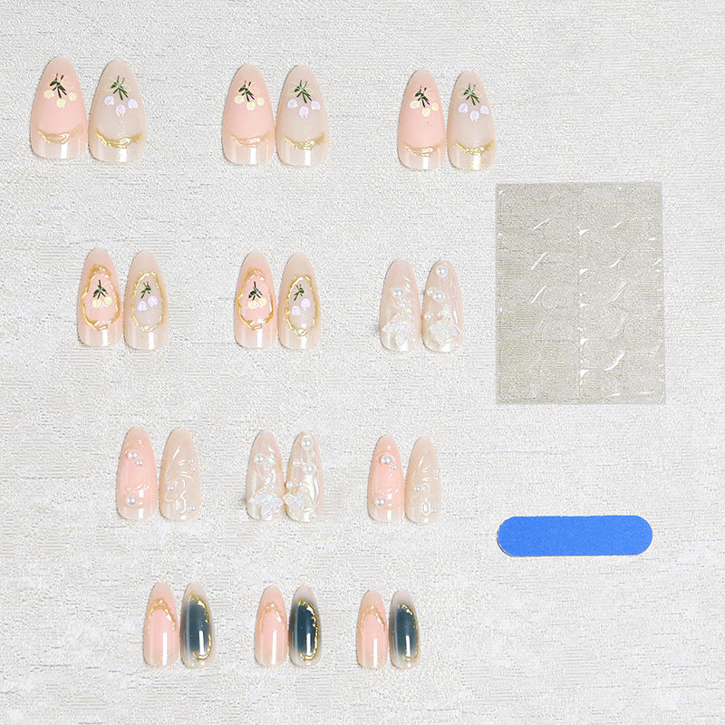 Elegant artificial nails with holographic and floral decorations Bowlift