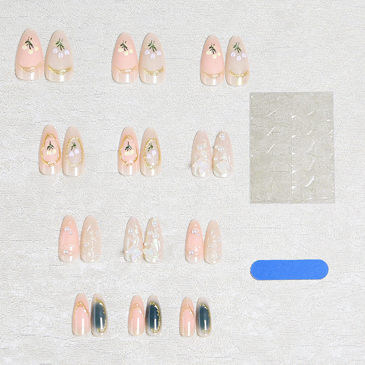 Elegant artificial nails with holographic and floral decorations Bowlift