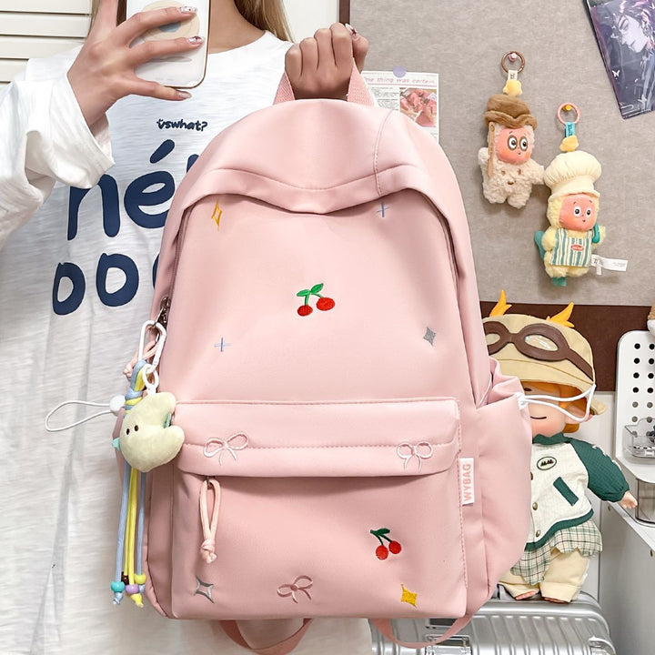 Playful backpack with embroidery Bowlift