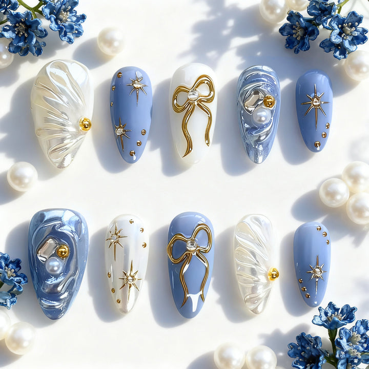 Acrylic nail set with glamorous golden accents Bowlift