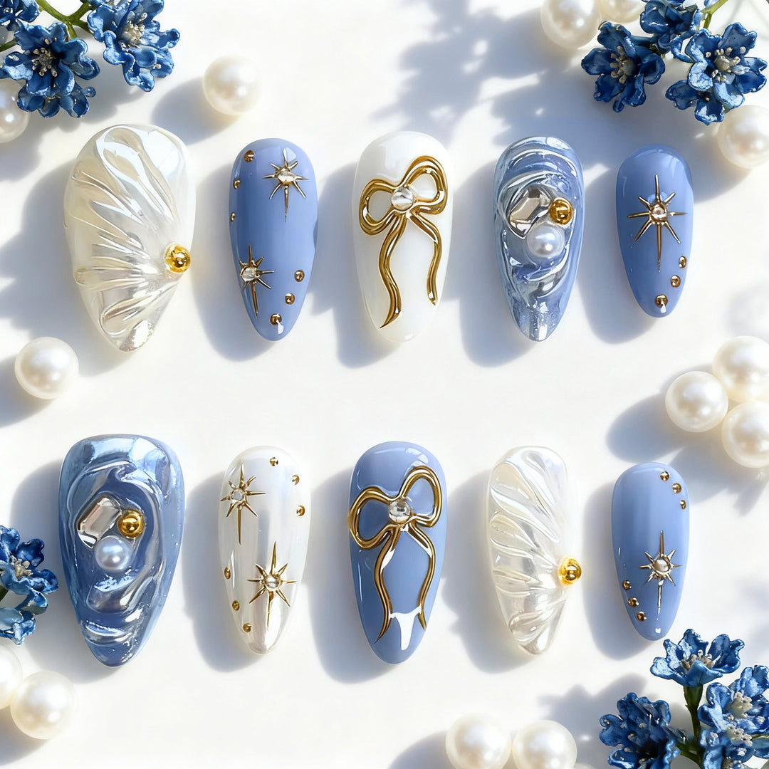 Acrylic nail set with glamorous golden accents Bowlift