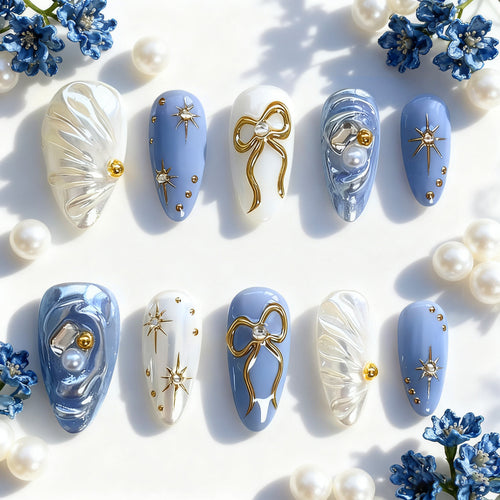 Acrylic nail set with glamorous golden accents Bowlift