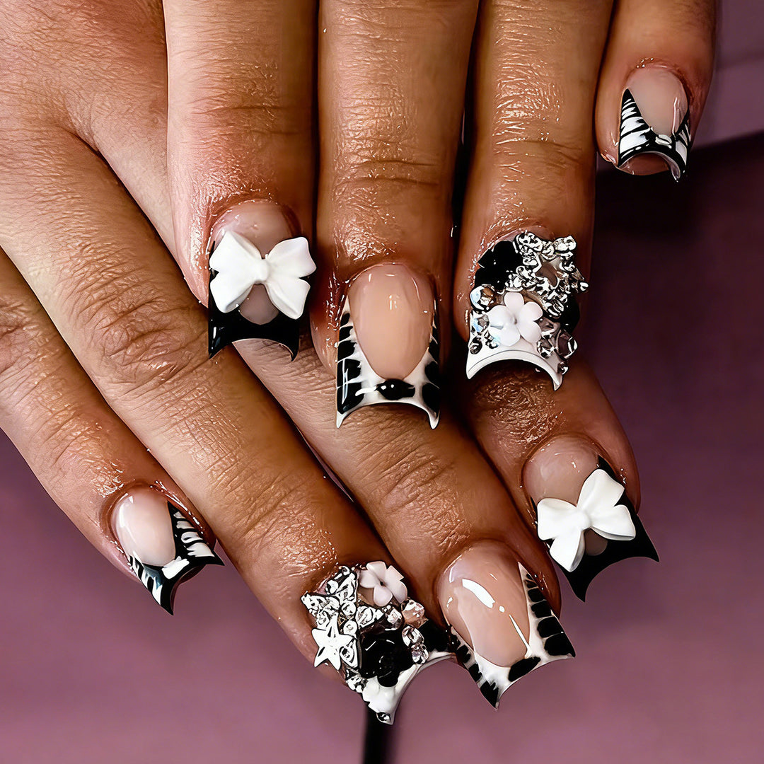 Elegant artificial nails with detailed embellishments Bowlift