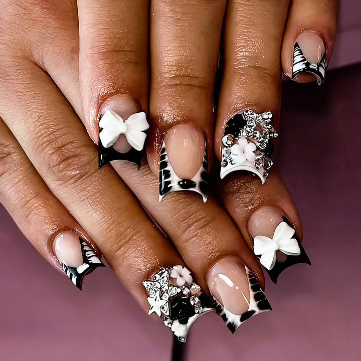 Elegant artificial nails with detailed embellishments Bowlift