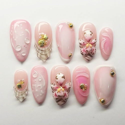 Creative acrylic nail set with elegant flower and glitter accents Bowlift