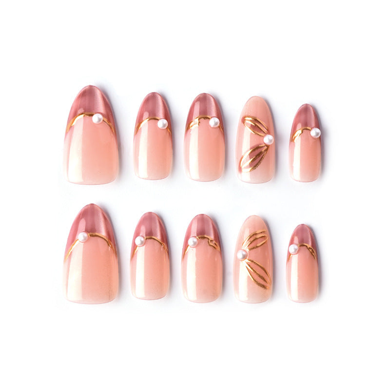 Nail set with glamorous golden accents and elegant design Bowlift