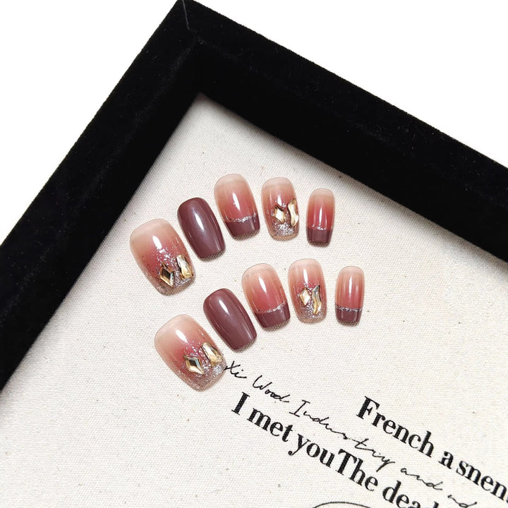 Acrylic nails in elegant ombre design with glitter elements Bowlift