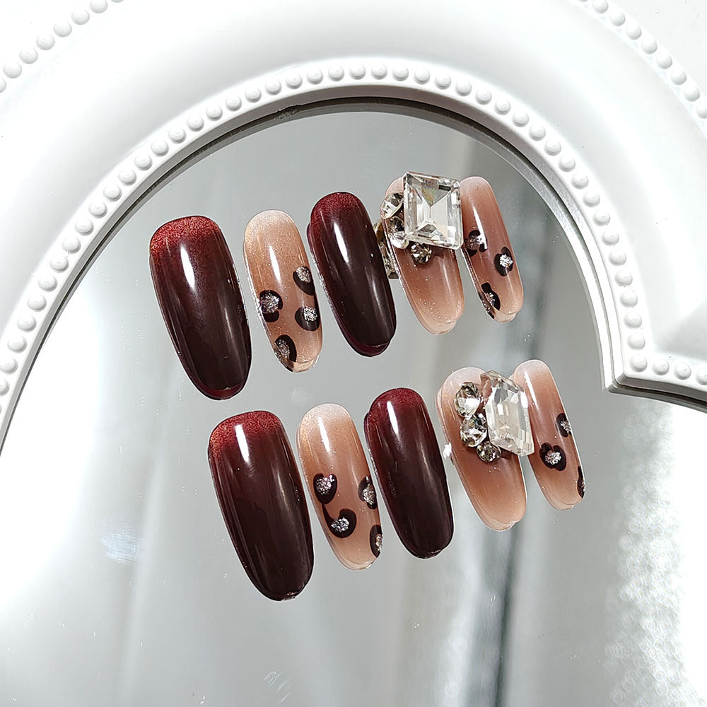 Luxury artificial nails with elegant rhinestone applications Bowlift