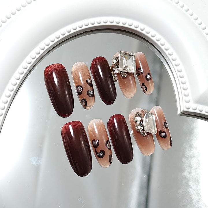 Luxury artificial nails with elegant rhinestone applications Bowlift