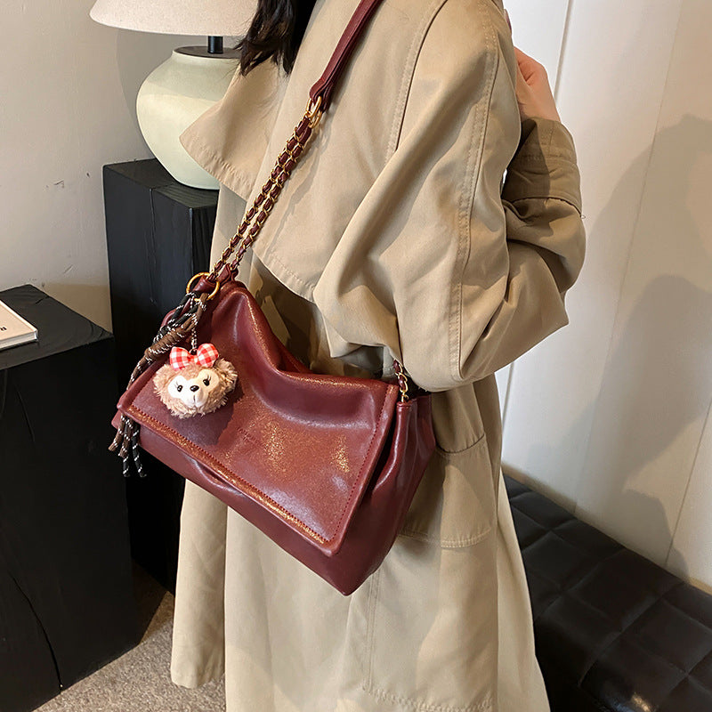 Elegant Chain-Handled Handbag Bowlift
