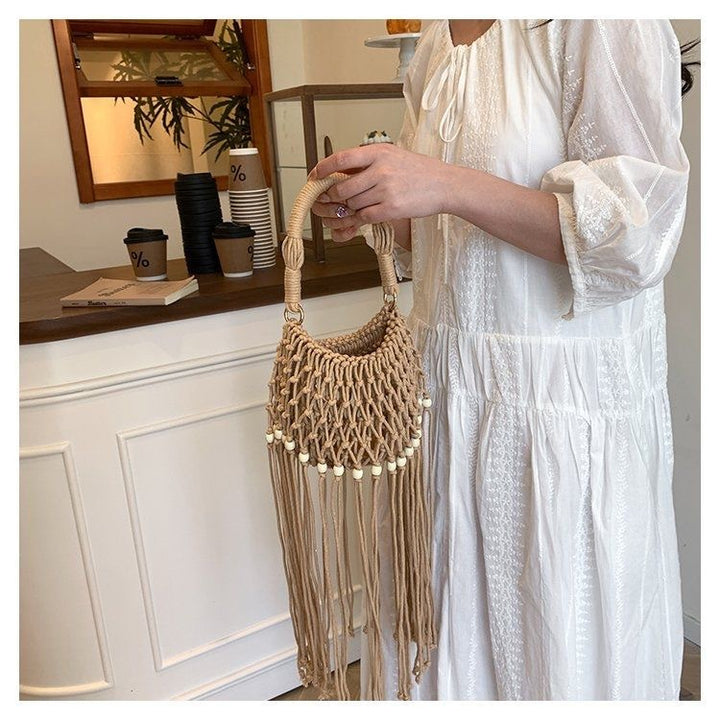Hand-knotted shoulder bag with tassels Bowlift
