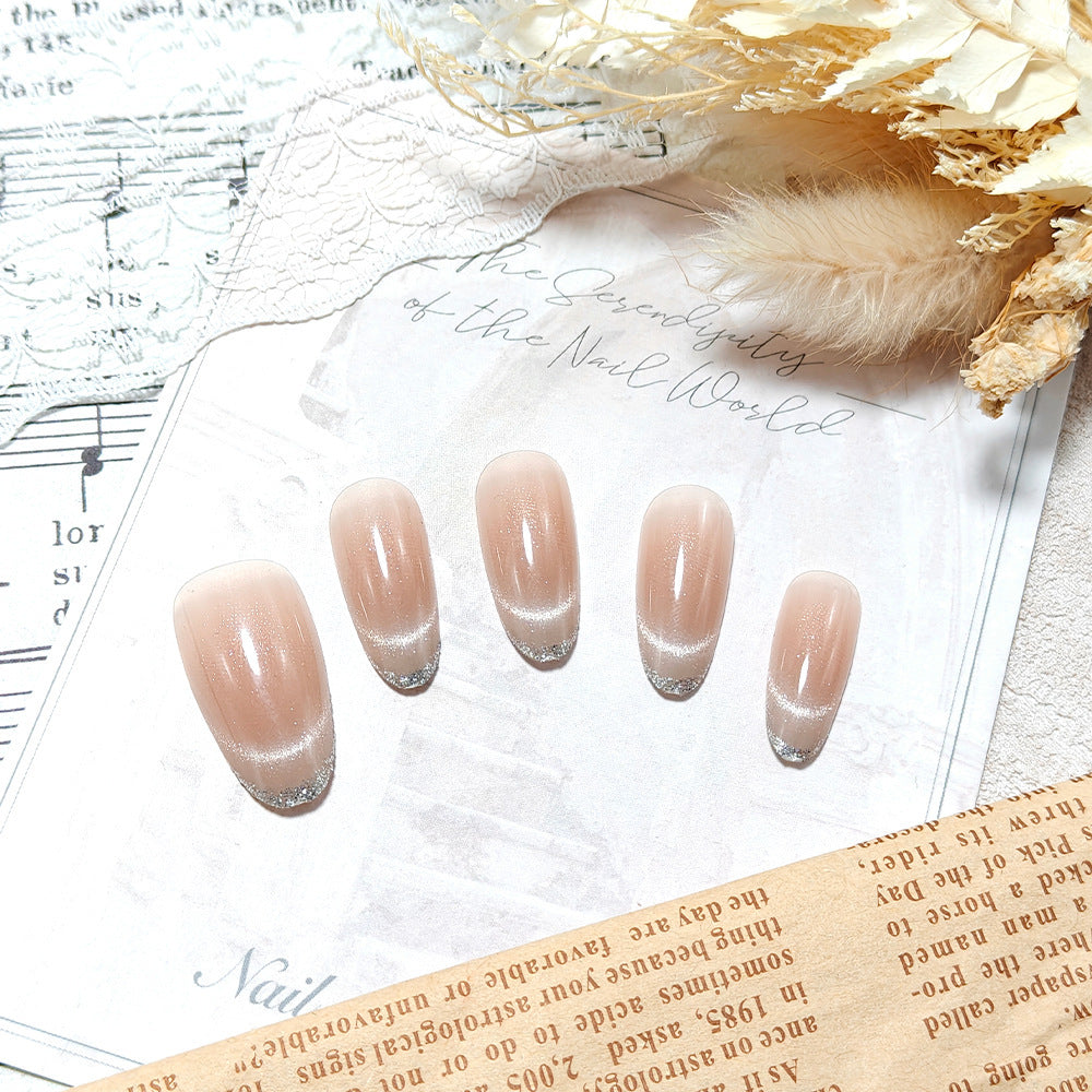 Artificial nails with elegant gloss and glitter accents Bowlift