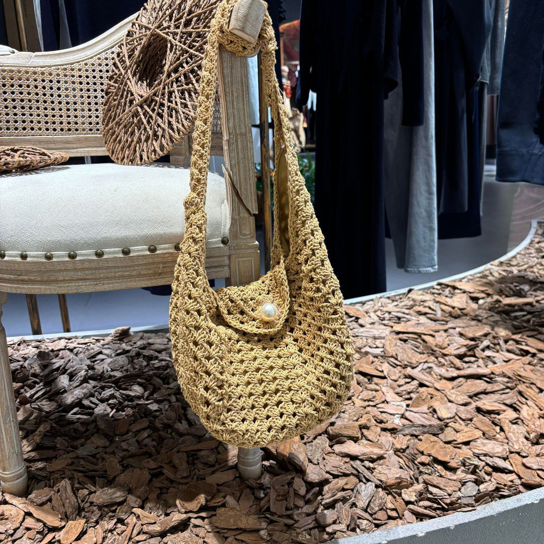 Hand-knotted shoulder bag with bead closure Bowlift