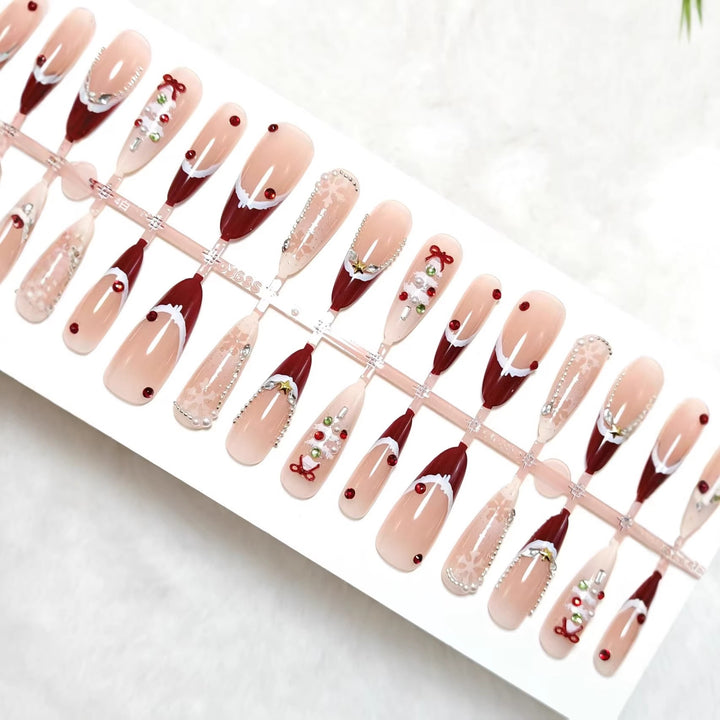 Artificial nails with festive designs and glitter accents Bowlift