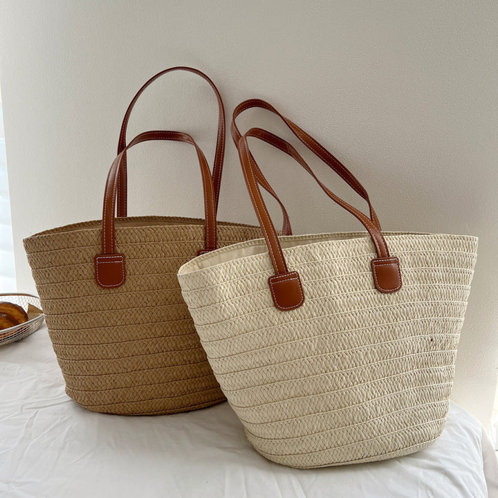 Handcrafted straw bag with elegant leather handles Bowlift