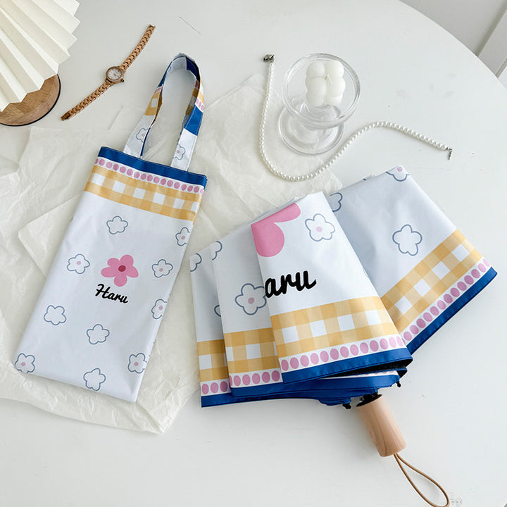 Ladies collapsible umbrella with playful floral pattern Bowlift
